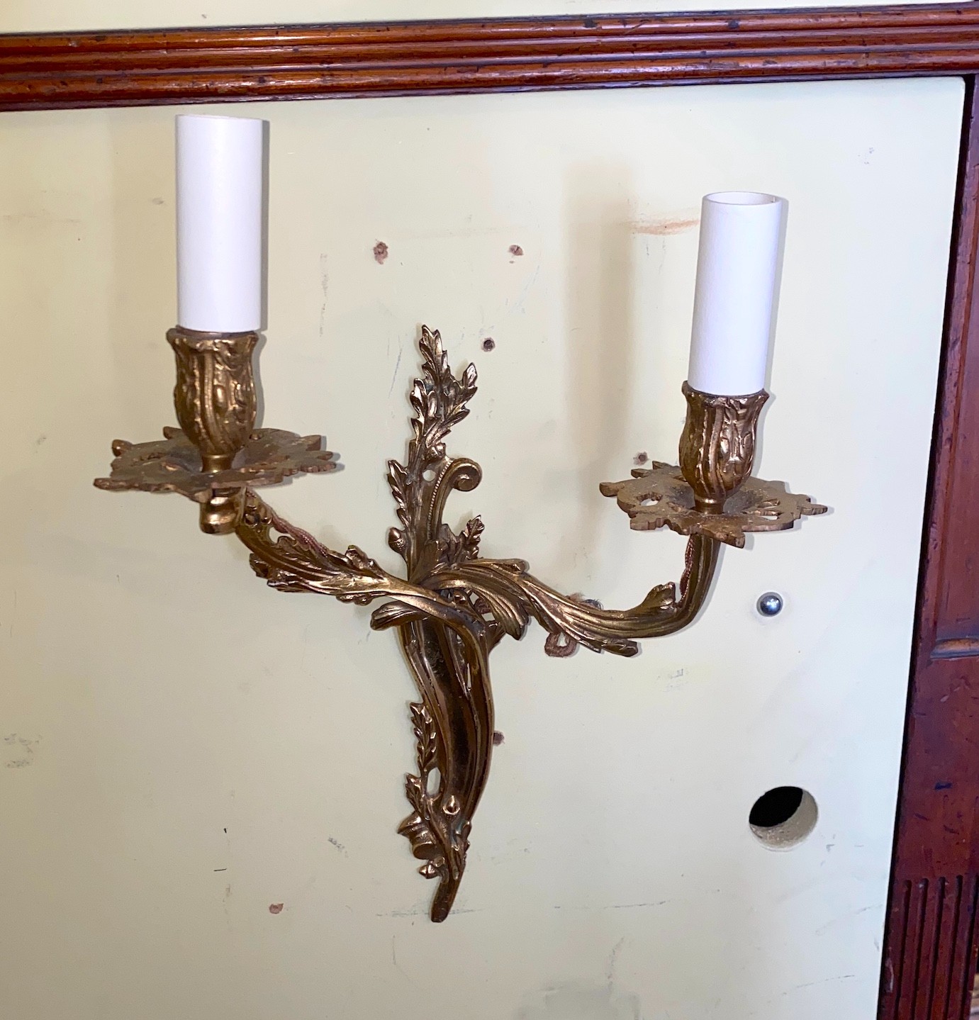 A pair of Louis XVI style ormolu twin branch wall lights, height 42cm, width 28cm